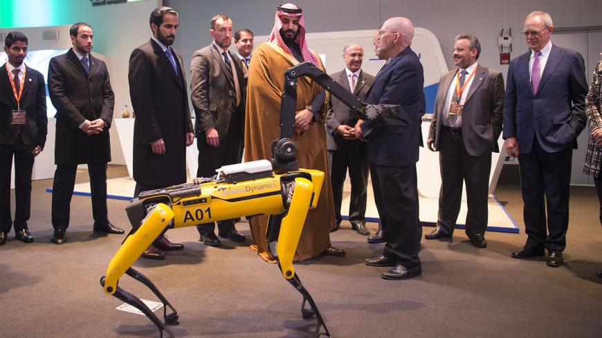 BOSTON, USA - MARCH 25: (----EDITORIAL USE ONLY  MANDATORY CREDIT - "BANDAR ALGALOUD / SAUDI KINGDOM COUNCIL / HANDOUT" - NO MARKETING NO ADVERTISING CAMPAIGNS - DISTRIBUTED AS A SERVICE TO CLIENTS----) Crown Prince of Saudi Arabia Mohammed bin Salman Al Saud (C) visits Innovation and Technology fair at Massachusetts Institute of Technology in Boston, Massachusetts, USA on March 25, 2018. (Photo by Bandar Algaloud / Saudi Kingdom Council / Handout/Anadolu Agency/Getty Images)