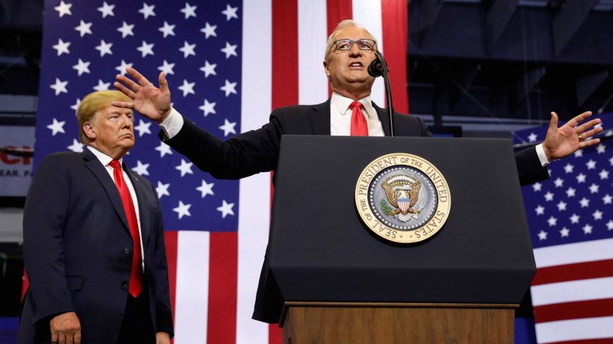 U.S. President Donald Trump listens at a rally in support of Rep. Kevin Cramer (R) in his run for Senate in Fargo, North Dakota, U.S. June 27, 2018. REUTERS/Kevin Lamarque - RC1ECB7F9050