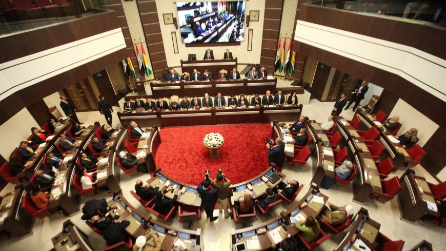 Members of the Parliament of the Kurdistan region vote on the ministerial list of the Kurdistan Regional Government headed by Masrour Barzani in Erbil, Iraq July 10, 2019. REUTERS/Azad Lashkari - RC1EA4570DE0