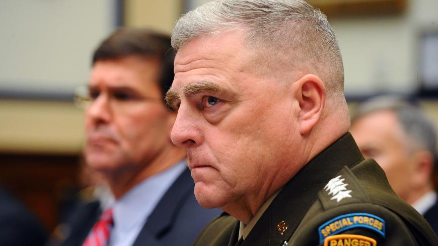 U.S. Defense Secretary Mark Esper and Army Gen. Mark Milley, chairman of the Joint Chiefs of Staff, testify before a House Armed Services Committee hearing on "U.S. Policy in Syria and the Broader Region," at the Rayburn House office building in Washington, U.S., December 11, 2019. REUTERS/Mary F. Calvert - RC25TD96MM2I