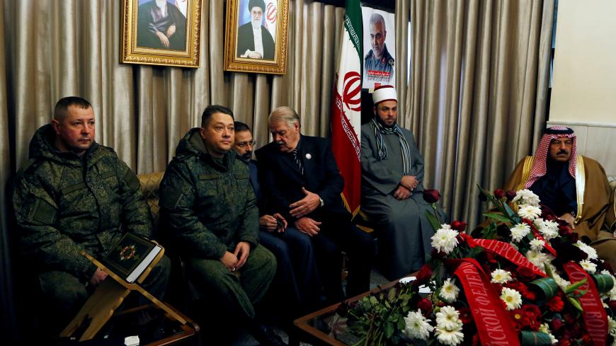 Russian military personnel attend a memorial service for the late Iranian Major-General Qassem Soleimani, head of the elite Quds Force, at the Iranian embassy in Damascus, Syria, January 5, 2020. REUTERS/Yamam Al Shaar - RC2Q9E9GR7ZS