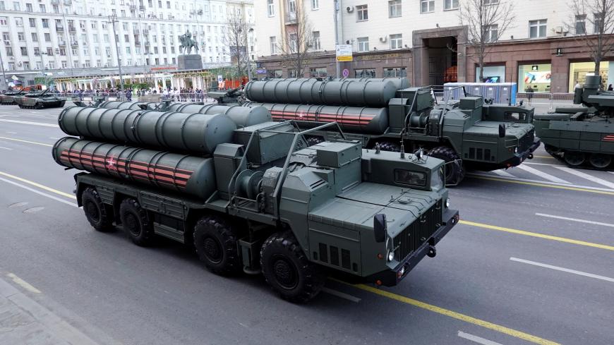 Russian servicemen sit in the cabins of S-400 missile air defence systems in Tverskaya Street before a rehearsal for the Victory Day parade, which marks the anniversary of the victory over Nazi Germany in World War Two, in central Moscow, Russia April 29, 2019. REUTERS/Tatyana Makeyeva - RC1E849FD530
