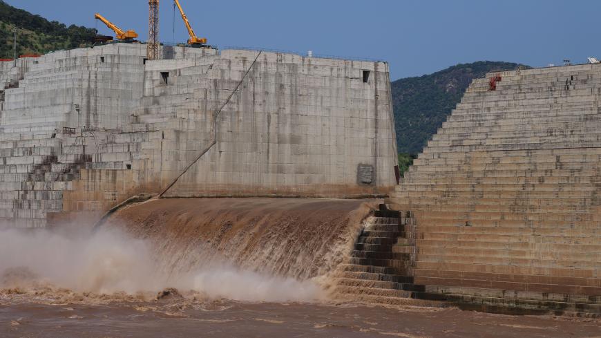 Water flows through Ethiopia's Grand Renaissance Dam as it undergoes construction work on the river Nile in Guba Woreda, Benishangul Gumuz Region, Ethiopia September 26, 2019. Picture taken September 26, 2019. REUTERS/Tiksa Negeri - RC18957504D0