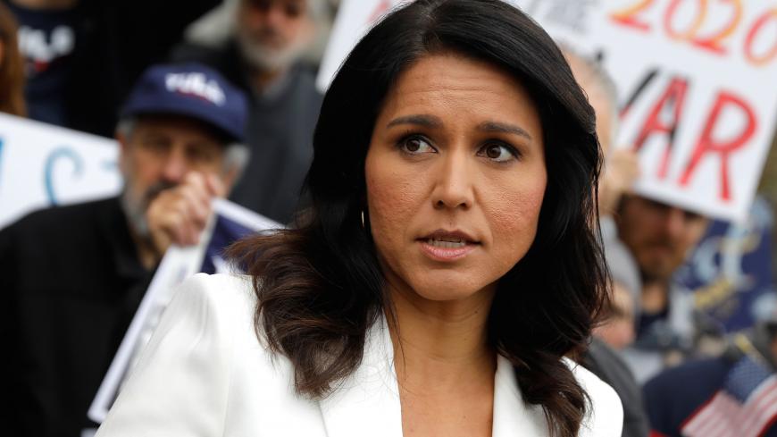 U.S. Democratic Presidential candidate Tulsi Gabbard greets supporters after filing her declaration of candidacy papers to appear on the 2020 New Hampshire primary election ballot at the State House in Concord, New Hampshire, U.S., November 5, 2019. REUTERS/Mike Segar - RC1696ABFE70