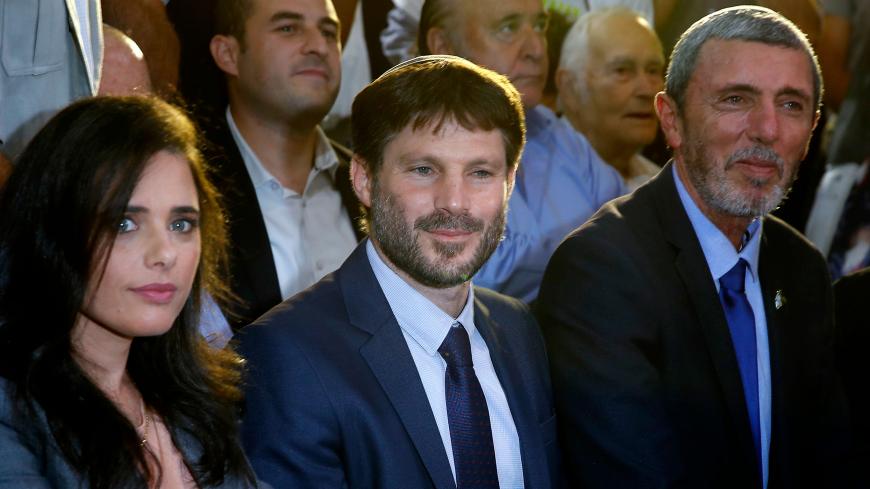 Former Israeli Justice Minister Ayelet Shaked attends the launch of the political party "Yemina", which she formed with Transportation Minister Bezalel Smotrich (C) and Education Minister Rafi Peretz (R), on August 12, 2019 in the Israeli city of Ramat Gan. (Photo by JACK GUEZ / AFP) (Photo credit should read JACK GUEZ/AFP via Getty Images)