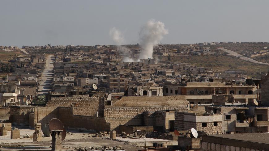 Smoke billows following a reported air strike by pro-regime forces in the town of Maaret Al-Numan in Syria's northwestern Idlib province on January 13, 2020. (Photo by Abdulaziz KETAZ / AFP) (Photo by ABDULAZIZ KETAZ/AFP via Getty Images)