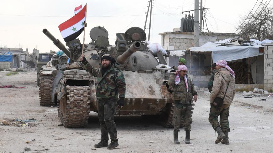 Syrian government forces deploy near the Damascus-Aleppo highway in the southern part of Syria's northern Aleppo province on February 10, 2020. - Syrian regime artillery killed five Turkish soldiers in Idlib today, Turkey's defence ministry said, as the number of people displaced by violence in the region neared 700,000 since December. (Photo by - / AFP) (Photo by -/AFP via Getty Images)