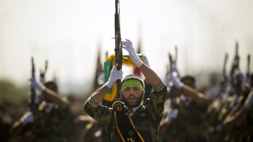 EDITORS' NOTE: Reuters and other foreign media are subject to Iranian restrictions on their ability to report, film or take pictures in Tehran.

Members of Iran's Basij militia march during a parade to commemorate the anniversary of the Iran-Iraq war (1980-88), in Tehran September 22, 2010. Iranian leaders hoping to lift morale at a time of rising prices, food shortages and threats of attack from Israel, are drawing on memories of another era when people united against a common foe: Saddam Hussein's Iraq. P