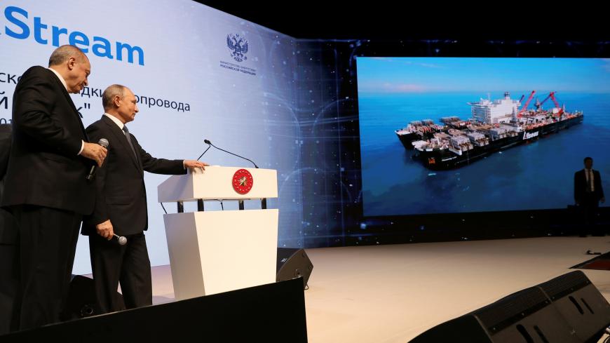 Russian President Vladimir Putin (R) and his Turkish counterpart Tayyip Erdogan attend a ceremony to mark the completion of the sea part of the TurkStream gas pipeline, in Istanbul, Turkey November 19, 2018. Sputnik/Mikhail Klimentyev/Kremlin via REUTERS ATTENTION EDITORS - THIS IMAGE WAS PROVIDED BY A THIRD PARTY. - RC14A5B335A0