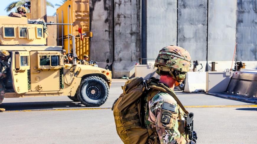 U.S. Army soldiers from 1st Brigade, 25th Infantry Division, Task Force-Iraq, man a defensive position at Forward Operating Base Union III in Baghdad, Iraq, December 31, 2019. U.S. Army/Staff Sgt. Desmond Cassell/Task Force-Iraq Public Affairs/Handout via REUTERS.  THIS IMAGE HAS BEEN SUPPLIED BY A THIRD PARTY. - RC2P6E96MAPN