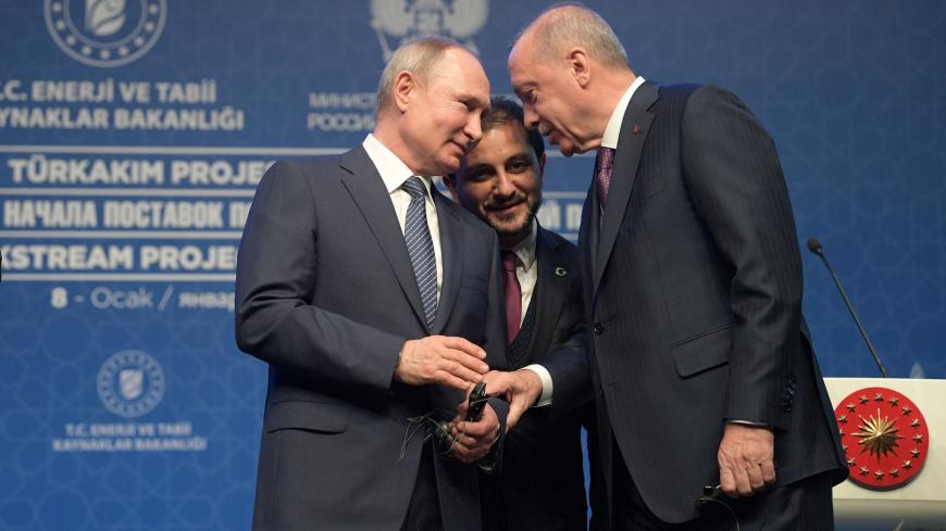 Russian President Vladimir†Putin and Turkish President Tayyip Erdogan talk during a ceremony marking the formal launch of the TurkStream natural gas pipeline, in Istanbul, Turkey January 8, 2020. Sputnik/Alexei Druzhinin/Kremlin via REUTERS ATTENTION EDITORS - THIS IMAGE WAS PROVIDED BY A THIRD PARTY. - RC2RBE9YSAA7