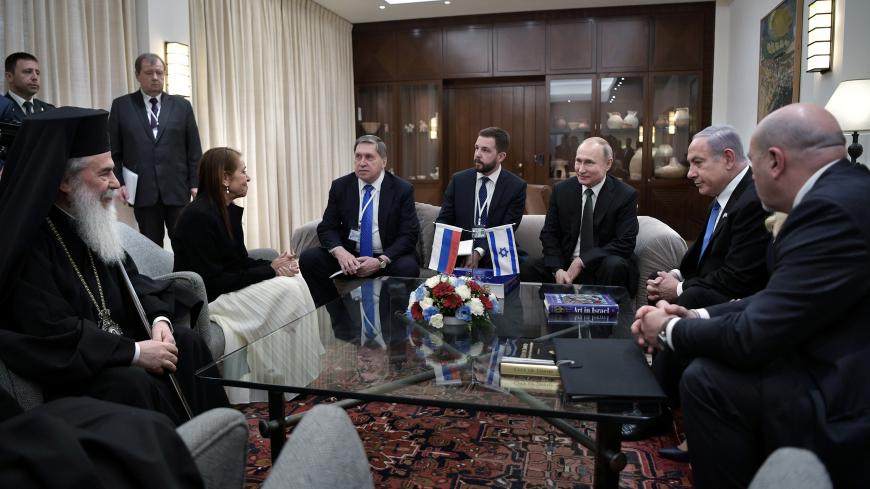 Russian President Vladimir Putin, Israeli Prime Minister Benjamin Netanyahu, Yaffa Issachar, mother of Naama Issachar who is jailed in Russia on drug charges, and officials attend a meeting in Jerusalem, January 23, 2020. Sputnik/Alexei Nikolskyi/Kremlin via REUTERS ATTENTION EDITORS - THIS IMAGE WAS PROVIDED BY A THIRD PARTY. - RC2MLE9IX6KG