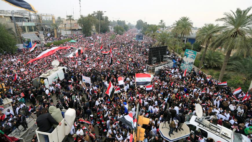 Supporters of Iraqi Shi'ite cleric Moqtada al-Sadr protest against what they say is U.S. presence and violations in Iraq, during a demonstration in Baghdad, Iraq January 24, 2020. REUTERS/Thaier al-Sudani - RC28ME988GRG
