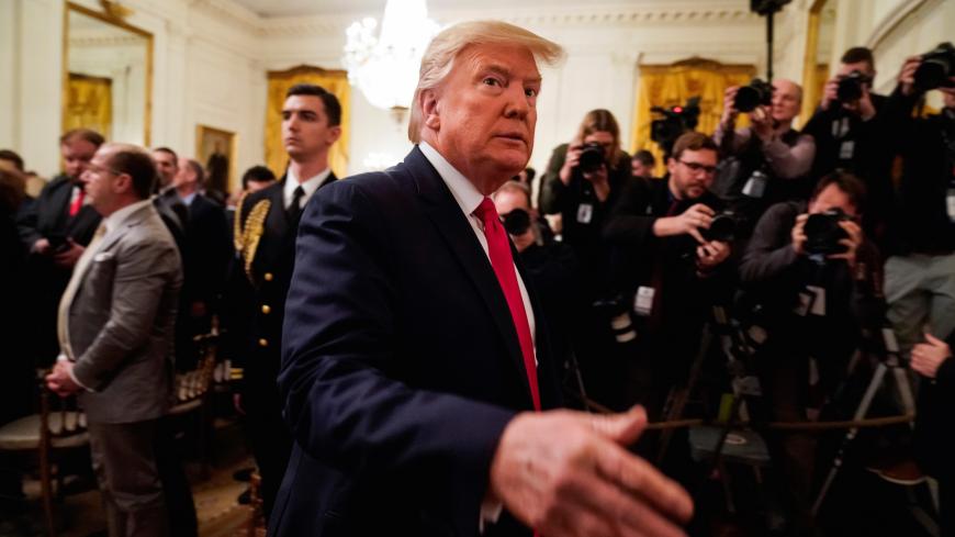 U.S. President Donald Trump departs after delivering joint remarks with Israel's Prime Minister Benjamin Netanyahu on a new Middle East peace plan proposal in the East Room of the White House in Washington, U.S., January 28, 2020. REUTERS/Joshua Roberts - RC29PE9YHG9K