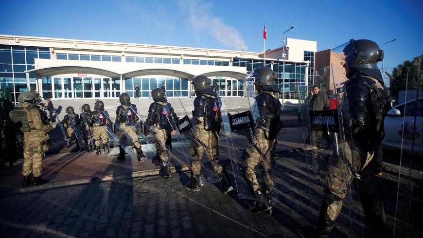Turkish soldiers walk outside the Silivri Prison and Courthouse complex during the first trial related to Turkey's failed coup, in Istanbul, Turkey, December 27, 2016. REUTERS/Osman Orsal TPX IMAGES OF THE DAY - RC1D5933D280