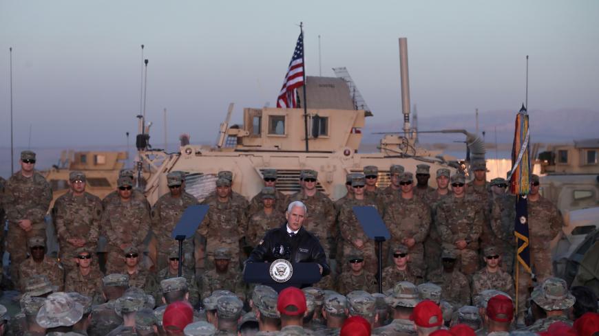 U.S. Vice President Mike Pence delivers remarks to U.S. troops at a U.S. military facility at Erbil International Airport in Erbil, Iraq November 23, 2019. REUTERS/Jonathan Ernst TPX IMAGES OF THE DAY - RC22HD9OIH8O