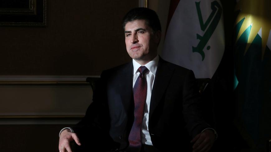 President of the Kurdistan region in Iraq Nechirvan Barzani sits in a shaft of window light as he greets U.S. Vice President Mike Pence in the VIP terminal at Erbil International Airport in Erbil, Iraq November 23, 2019. REUTERS/Jonathan Ernst - RC23HD91WQR6