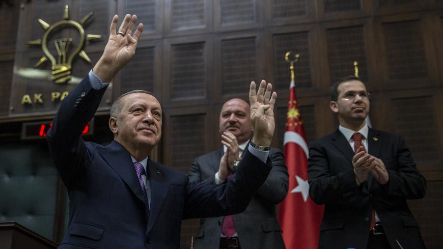 ANKARA, TURKEY - FEBRUARY 26: President of Turkey and leader of Justice and Development (AK) Party, Recep Tayyip Erdogan greets party members as he attends his party's group meeting at Grand National Assembly of Turkey in Ankara, Turkey on February 26, 2020. (Photo by Ali Balikci/Anadolu Agency via Getty Images)