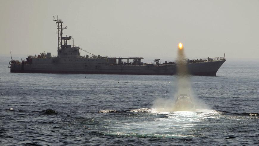 An Iranian warship and speed boats take part in a naval war game in the Persian Gulf and the Strait of Hormuz, southern Iran April 22, 2010. Iran's Revolutionary Guards successfully deployed a new speed boat capable of destroying enemy ships as war games began on Thursday in a waterway crucial for global oil supplies, Iranian media reported.  REUTERS/Fars News    (IRAN - Tags: MILITARY POLITICS) QUALITY FROM SOURCE. FOR EDITORIAL USE ONLY. NOT FOR SALE FOR MARKETING OR ADVERTISING CAMPAIGNS - GM1E64M1H8101