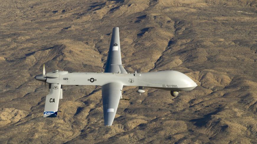 A U.S. Air Force MQ-1 Predator unmanned aerial vehicle assigned to the California Air National Guard's 163rd Reconnaissance Wing flies near the Southern California Logistics Airport in Victorville, California in this January 7, 2012 USAF handout photo obtained by Reuters February 6, 2013. REUTERS/U.S. Air Force/Tech. Sgt. Effrain Lopez/Handout (UNITED STATES - Tags: MILITARY POLITICS) THIS IMAGE HAS BEEN SUPPLIED BY A THIRD PARTY. IT IS DISTRIBUTED, EXACTLY AS RECEIVED BY REUTERS, AS A SERVICE TO CLI
