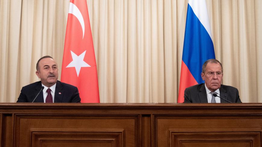 Turkish Foreign Minister Mevlut Cavusoglu and Russian Foreign Minister Sergei Lavrov attend a joint news conference following their talks in Moscow, Russia January 13, 2020. Pavel Golovkin/Pool via REUTERS - RC24FE9UDIWO