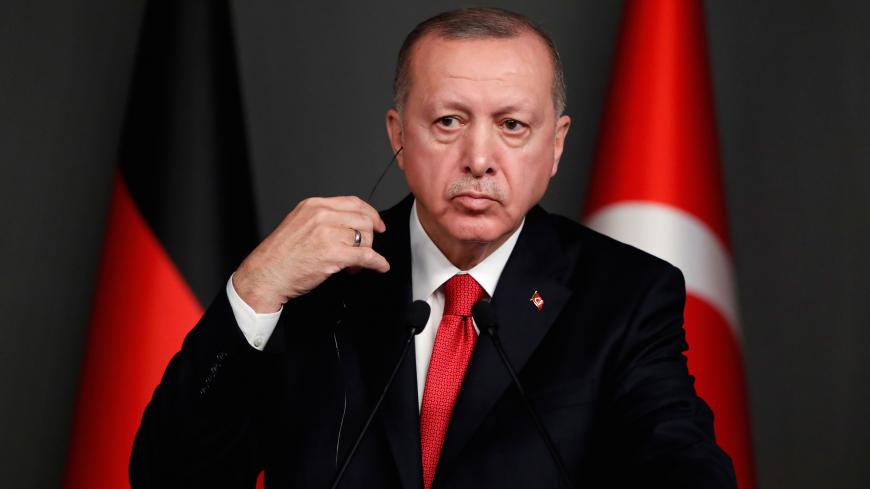 Turkish President Tayyip Erdogan attends a joint news conference with German Chancellor Angela Merkel in Istanbul, Turkey, January 24, 2020. REUTERS/Umit Bektas - RC2EME9CRYDD