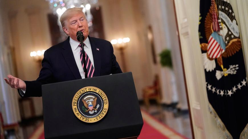 U.S. President Donald Trump delivers a statement about his acquittal in the East Room of the White House in Washington, U.S., February 6, 2020. REUTERS/Joshua Roberts - RC27VE985OCV