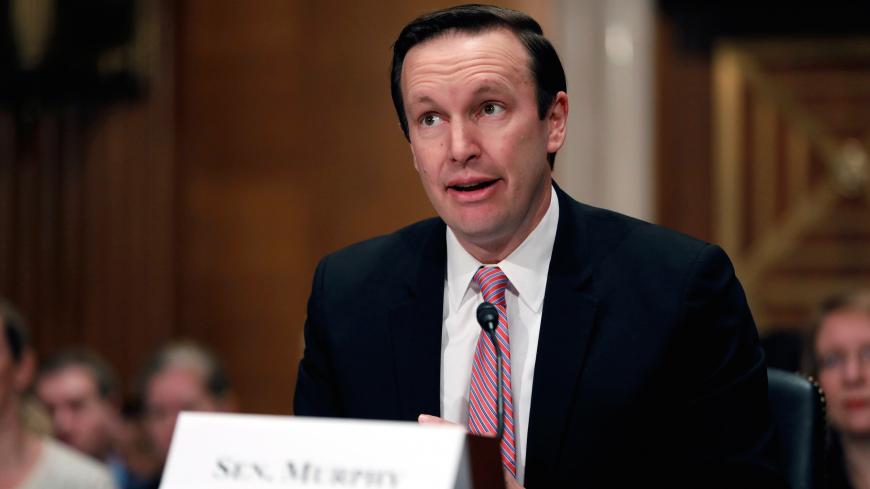 Senator Chris Murphy (D-CT) introduces Dr. Scott Gottlieb before a Senate Health Education Labor and Pension Committee confirmation hearing on his nomination to be commissioner of the Food and Drug Administration on Capitol Hill in Washington, D.C., U.S., April 5, 2017. REUTERS/Aaron P. Bernstein - RC17DAB50AD0