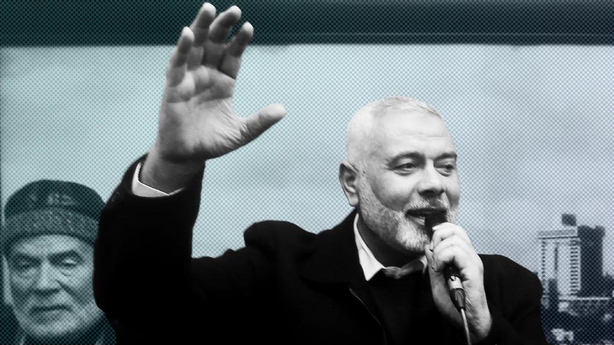 Palestinian Hamas Chief Ismail Haniyeh welcomes Hamas members who went missing in Egypt a few years ago, after their arrival in Gaza City February 28, 2019. REUTERS/Ibraheem Abu Mustafa - RC18F17FF320