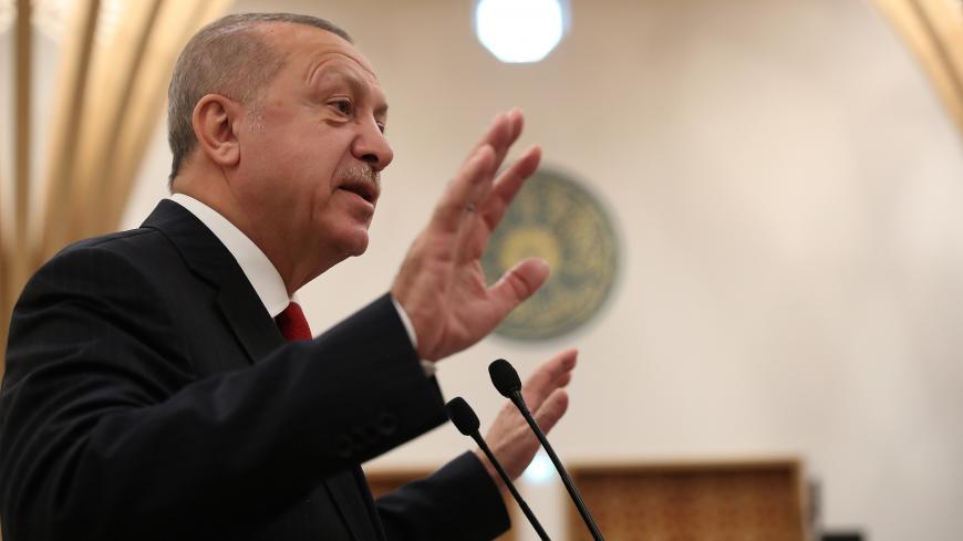 President of Turkey Recep Tayyip Erdogan adresses the audience during the official opening of the new Cambridge Central Mosque, in Cambridge, Britain, December 5, 2019. Murat Cetinmuhurdar/Presidential Press Office/Handout via REUTERS THIS IMAGE HAS BEEN SUPPLIED BY A THIRD PARTY. - RC23PD94I1I1