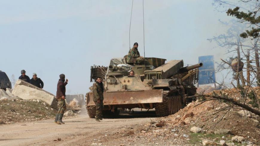 Syrian army soldiers are deployed in the town of Khan al-Assal, west of Aleppo, Syria, in this handout released by SANA on February 16, 2020.  SANA/Handout via REUTERS ATTENTION EDITORS - THIS IMAGE WAS PROVIDED BY A THIRD PARTY. REUTERS IS UNABLE TO INDEPENDENTLY VERIFY THIS IMAGE. - RC2D2F9HPED5