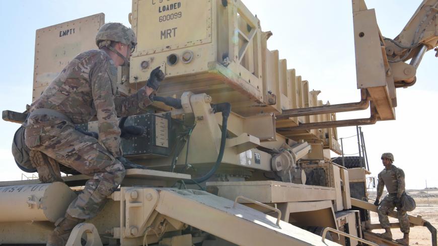 Specialist Tevin Howe and Specialist Eduardo Martinez take part in training on a U.S. Army Patriot surface-to-air missile launcher at Al Dhafra Air Base, United Arab Emirates, January 12, 2019. Picture taken January 12, 2019. U.S. Air Force/Tech. Sgt. Darnell T. Cannady/Handout via REUTERS. ATTENTION EDITORS - THIS IMAGE WAS PROVIDED BY A THIRD PARTY - RC1CE04C3590