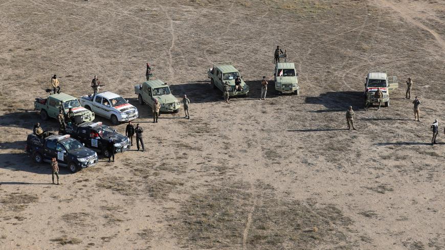 Iraqi security forces are seen during military operations to search for Islamic State militants in Anbar province, Iraq December 29, 2019. REUTERS/Thaier Al-Sudani - RC275E9K0C8B