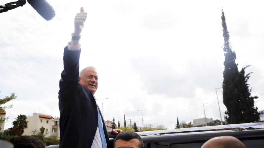 Leader of Blue and White party, Benny Gantz gestures outside a polling station as Israelis vote in a national election, in Rosh Ha'ayin, Israel March 2, 2020. REUTERS/Nir Elias - RC2JBF927KFH