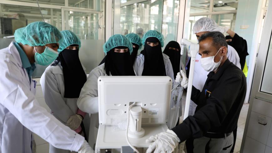 Nurses receive training on using ventilators, recently provided by the World Health Organization at the intensive care ward of a hospital allocated for novel coronavirus patients in preparation for any possible spread of the coronavirus disease (COVID-19), in Sanaa, Yemen April 8, 2020. Picture taken April 8, 2020. REUTERS/Khaled Abdullah - RC231G9K4EXG