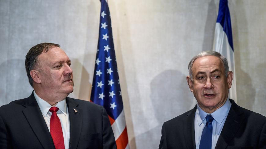 The United States Secretary of State Mike Pompeo meets Israeli Prime Minister Benjamin Netanyahu in Lisbon Portugal, December 4, 2019. Patricia de Melo Moreira/Pool via REUTERS - RC2JOD90E3QR