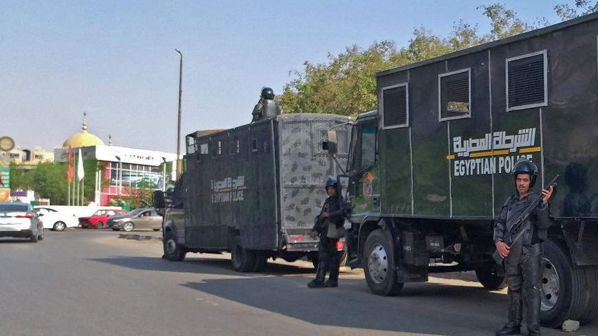 Egyptian riot police stand guard in Egypt's capital Cairo on September 27, 2019. - Egypt's President dismissed today a call for a second weekend of protests as "no reason for concern", with hundreds already arrested in an intensifying crackdown on a rare show of discontent on the streets. (Photo by Khaled DESOUKI / AFP)        (Photo credit should read KHALED DESOUKI/AFP via Getty Images)