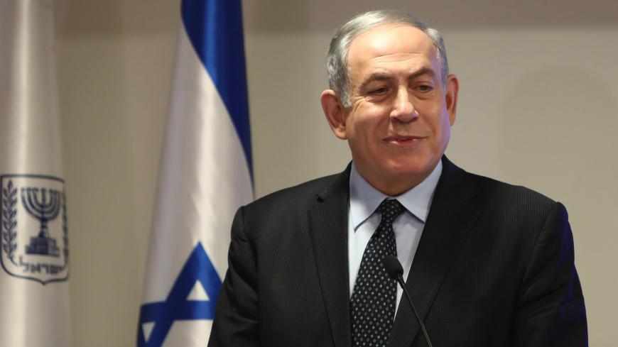 Prime Minister Benjamin Netanyahu slistens during a joint press conference with Israel's health minister regarding preparations and new regulations for the coronavirus, at the Health Ministry in Jerusalem on March 4, 2020. (Photo by GALI TIBBON / AFP) (Photo by GALI TIBBON/AFP via Getty Images)