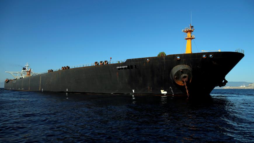 REFILE - CORRECTING GRAMMAR  Iranian oil tanker Adrian Darya 1, previously named Grace 1, sits anchored after the Supreme Court of the British territory lifted its detention order, in the Strait of Gibraltar, Spain, August 18, 2019. REUTERS/Jon Nazca - RC1770F4BD80