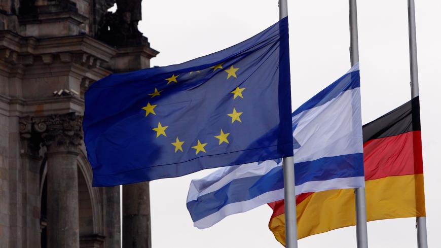 Flags of EU, Israel and Germany flutter next to the Bundestag ahead of Israeli President Reuven Rivlin speech in Germany’s lower house of parliament to commemorate the victims of the Nazi dictatorship, January 29, 2020. REUTERS/Michele Tantussi - RC2LPE9P7DWC