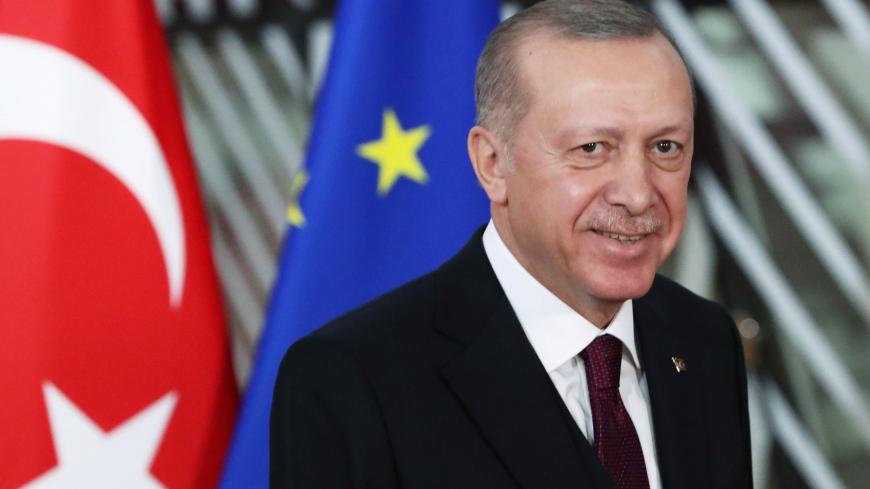 Turkish President Tayyip Erdogan reacts ahead of a meeting with EU Council President Charles Michel pose in Brussels, Belgium March 9, 2020. REUTERS/Yves Herman - RC2HGF9LYPKR