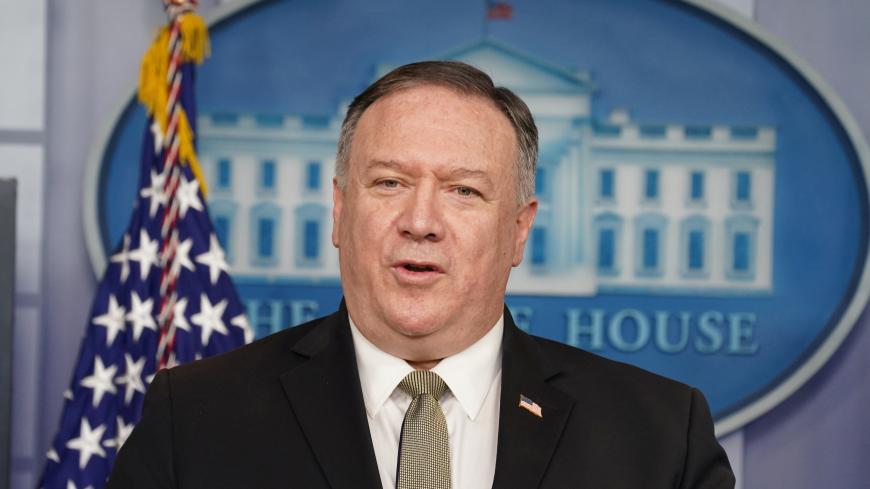 U.S.  Secretary of State Mike Pompeo addresses the daily coronavirus task force briefing at the White House in Washington, U.S., April 8, 2020. REUTERS/Kevin Lamarque - RC2M0G9CRVU4