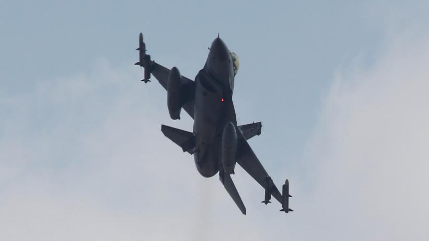 A Turkish F-16 fighter jet takes off from Incirlik airbase in the southern city of Adana, Turkey, July 27, 2015. To match Insight TURKEY-SECURITY/AIRFORCE  REUTERS/Murad Sezer/File Photo - S1AEULZGSTAA