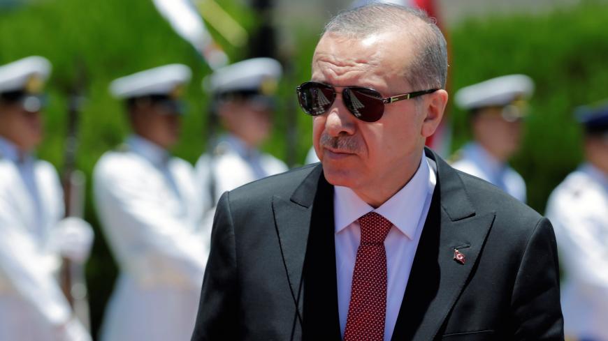 Turkish President Tayyip Erdogan attends a welcoming ceremony at the Presidential Palace in Asuncion, Paraguay December 2, 2018. REUTERS/Jorge Adorno - RC1A83AAAAA0
