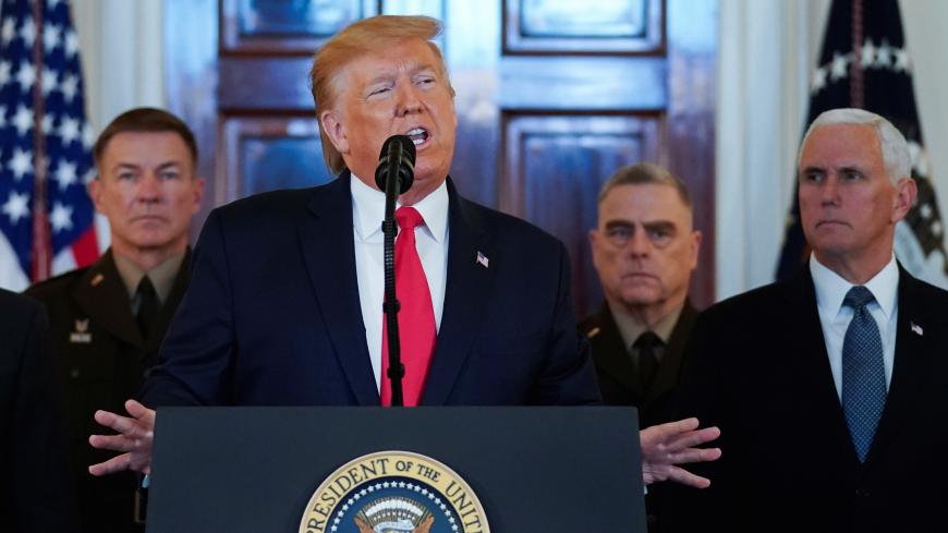 U.S. President Donald Trump delivers a statement about Iran flanked by U.S. Army Chief of Staff General James McConville, Chiarman of the Joint Chiefs of Staff Army General Mark Milley and Vice President Mike Pence in the Grand Foyer at the White House in Washington, U.S., January 8, 2020. REUTERS/Kevin Lamarque - RC2SBE92PGSC