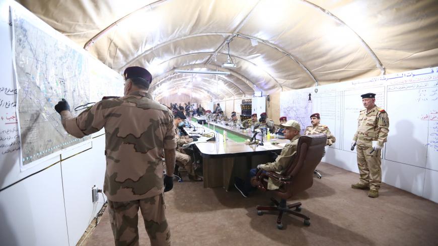 Iraqi Prime Minister Mustafa al-Kadhimi meets with senior Iraqi officers during his visit in Kirkuk, Iraq June 2, 2020. Iraqi Prime Minister Media Office/Handout via REUTERS ATTENTION EDITORS - THIS IMAGE WAS PROVIDED BY A THIRD PARTY. - RC251H9N531M