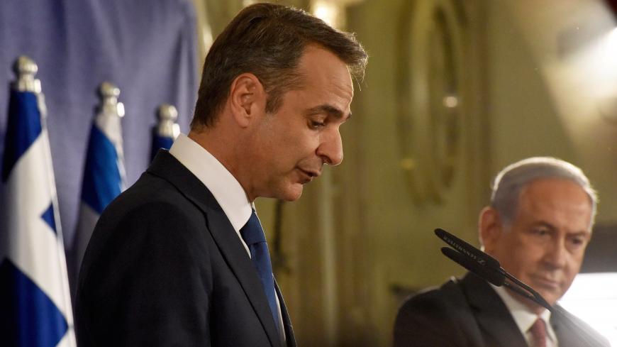 Israeli Prime Minister Benjamin Netanyahu and Greek Prime Minister Kyriakos Mitsotakis issue joint statements in Jerusalem, June 16, 2020. Debbie Hill/Pool via REUTERS - RC2BAH9GJTED