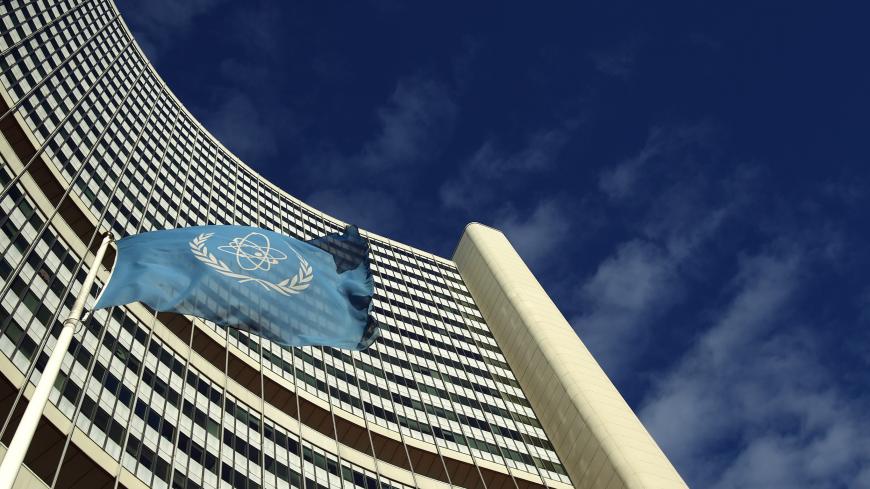 The flag of the International Atomic Energy Agency (IAEA) flies in front of its headquarters during a board of governors meeting in Vienna November 28, 2013. Iran has invited U.N. inspectors to visit a nuclear-related heavy water facility on December 8, their chief said on Thursday, a first concrete step under a plan to clarify concerns about Tehran's disputed nuclear programme. REUTERS/Heinz-Peter Bader  (AUSTRIA - Tags: POLITICS ENERGY) - BM2E9BS0WUX01