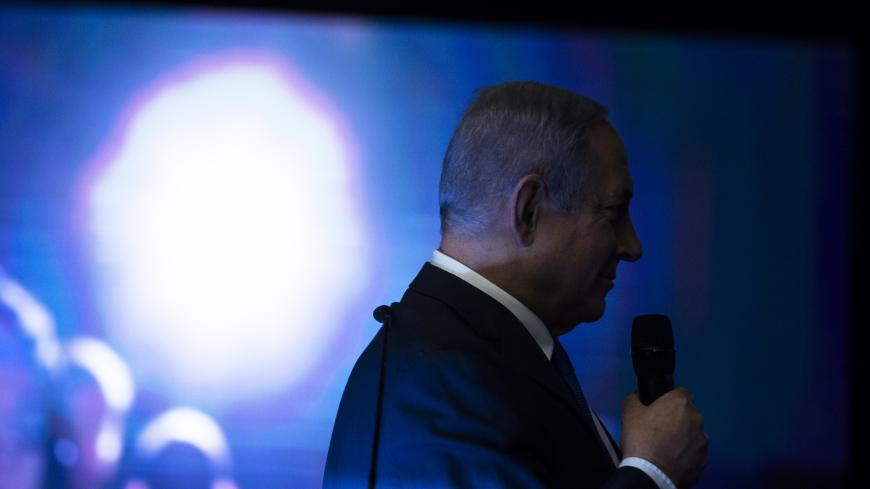 Benny Gantz (C), A former IDF Chief and the head of Israeli Resilience party speaks to supporters during an election campaign event in Tel Aviv. Israelis will vote in a parliamentary election on April 9, choosing among party lists of candidates to serve in the 121-seat Knesset