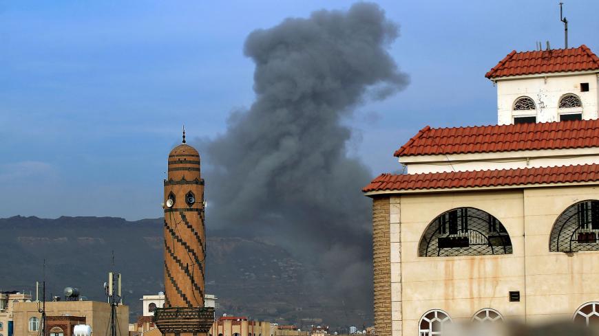 Smoke billows following an airstrike by Saudi-led coalition in the Yemeni capital Sanaa, on June 16, 2020. - Yemen is wracked by a war which has killed tens of thousands of people and led to the world's worst humanitarian crisis, according to the United Nations.
The war between Huthi rebels and pro-government forces escalated in 2015 when a Saudi-led military coalition intervened against the rebels who control large parts of Yemen including the capital Sanaa. (Photo by MOHAMMED HUWAIS / AFP) (Photo by MOHAM